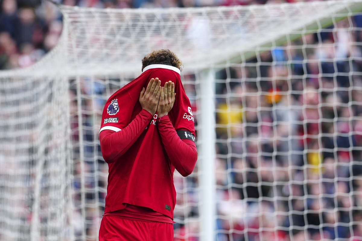 Liverpool's Curtis Jones reacts after missing a scoring chance during the English Premier League soccer match between Liverpool and Crystal Palace at Anfield Stadium in Liverpool, England, Sunday, April 14, 2024. (AP Photo/Jon Super)
