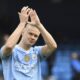 Manchester City's Erling Haaland applauds fans at the end of the English Premier League soccer match between Manchester City and Luton Town at Etihad stadium in Manchester, England, Saturday, April 13, 2024. (AP Photo/Rui Vieira)