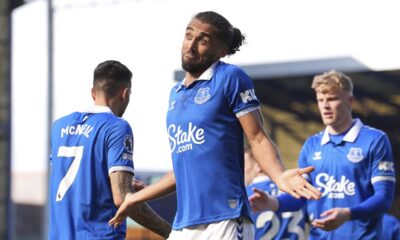 Everton's Dominic Calvert-Lewin, centre, celebrates scoring his side's first goal of the game, during the English Premier League soccer match between Everton and Burnley, at Goodison Park, in Liverpool, England, Saturday April 6, 2024. (Martin Rickett/PA via AP)