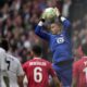 Lille's goalkeeper Lucas Chevalier save the ball during the Europa Conference League quarter final second leg soccer match between Lille and Aston Villa at the Pierre Mauroy stadium in Villeneuve d'Ascq, northern France, Thursday, April 18, 2024. (AP Photo/Christophe Ena)