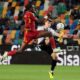 Udinese's Jaka Bijol, right, fights for the ball with Roma's Tammy Abraham during a Serie A soccer match between Udinese and Roma in Udine, northeastern Italy, Thursday, April 25, 2024. (Photo by Andrea Bressanutti/LaPresse via AP)