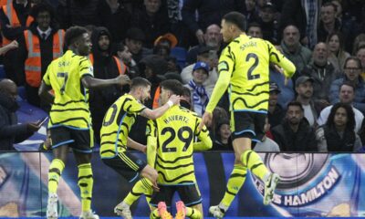 Arsenal's Kai Havertz, centre, celebrates with teammates after scoring his side's second goal during the English Premier League soccer match between Brighton and Hove Albion and Arsenal at the American Express Community Stadium in Brighton, England, Saturday, April 6, 2024. (AP Photo/Dave Shopland)