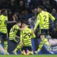 Arsenal's Kai Havertz, centre, celebrates with teammates after scoring his side's second goal during the English Premier League soccer match between Brighton and Hove Albion and Arsenal at the American Express Community Stadium in Brighton, England, Saturday, April 6, 2024. (AP Photo/Dave Shopland)