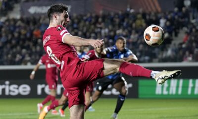 Liverpool's Dominik Szoboszlai reaches for the ball during the Europa League quarterfinal, second leg, soccer match between Atalanta and Liverpool at the Stadio di Bergamo, in Bergamo, Italy, Thursday, April 18, 2024. (AP Photo/Antonio Calanni)