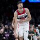 Washington Wizards forward Tristan Vukcevic celebrates a three-point shot during the second half of an NBA basketball game against the Milwaukee Bucks, Tuesday, April 2, 2024, in Washington. The Wizards won 117-113. (AP Photo/Alex Brandon)