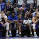 Golden State Warriors guards Klay Thompson, second from left, and Stephen Curry, second from right, sit on the bench during the second half of the team's NBA basketball play-in tournament game against the Sacramento Kings, Tuesday, April 16, 2024, in Sacramento, Calif. (AP Photo/Godofredo A. Vásquez)