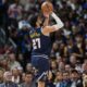 Denver Nuggets guard Jamal Murray goes up for a basket in the second half of Game 5 of an NBA basketball first-round playoff series against the Los Angeles Lakers Monday, April 29, 2024, in Denver. (AP Photo/David Zalubowski)