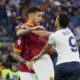 Lazio's Pedro, right, argues with Roma's Leandro Paredes during a Serie A soccer match between Roma and Lazio, at Stadio Olimpico, in Rome, Italy, Saturday, April 6, 2024. (AP Photo/Gregorio Borgia)