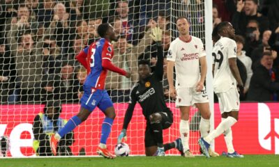 Crystal Palace's Tyrick Mitchell, centre, celebrates after scoring his side's third goal during the English Premier League soccer match between Crystal Palace and Manchester United at Selhurst Park stadium in London, England, Monday, May 6, 2024. (AP Photo/Ian Walton)