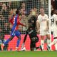 Crystal Palace's Tyrick Mitchell, centre, celebrates after scoring his side's third goal during the English Premier League soccer match between Crystal Palace and Manchester United at Selhurst Park stadium in London, England, Monday, May 6, 2024. (AP Photo/Ian Walton)