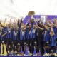 Inter players celebrate their victory of the "scudetto" after the Serie A soccer match between Inter and Lazio at the San Siro Stadium in Milan, Italy, Sunday, May 19, 2024. (Spada/LaPresse via AP)