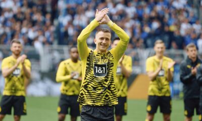 Dortmund's Marco Reus is congratulated before the Bundesliga soccer match between Borussia Dortmund and SV Darmstadt 98 at the Signal Iduna Park in Dortmund, Germany, Saturday May 18, 2024. This is last game of Marco Reus with Dortmund. Photo: Bernd Thissen/dpa - IMPORTANT NOTE: In accordance with the regulations of the DFL German Football League and the DFB German Football Association, it is prohibited to utilize or have utilized photographs taken in the stadium and/or of the match in the form of sequential images and/or video-like photo series./dpa via AP)