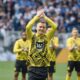 Dortmund's Marco Reus is congratulated before the Bundesliga soccer match between Borussia Dortmund and SV Darmstadt 98 at the Signal Iduna Park in Dortmund, Germany, Saturday May 18, 2024. This is last game of Marco Reus with Dortmund. Photo: Bernd Thissen/dpa - IMPORTANT NOTE: In accordance with the regulations of the DFL German Football League and the DFB German Football Association, it is prohibited to utilize or have utilized photographs taken in the stadium and/or of the match in the form of sequential images and/or video-like photo series./dpa via AP)