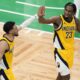 Indiana Pacers guard Tyrese Haliburton (0) high fives Indiana Pacers forward Aaron Nesmith (23) during the third quarter of Game 1 of the NBA Eastern Conference basketball finals, Tuesday, May 21, 2024, in Boston. (AP Photo/Michael Dwyer)