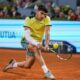Carlos Alcaraz, of Spain, returns the ball to Andrey Rublev, of Russia, during the Mutua Madrid Open tennis tournament in Madrid, Wednesday, May 1, 2024. (AP Photo/Manu Fernandez)