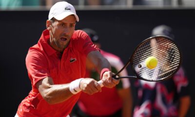 Serbia's Novak Djokovic returns the ball to Chile's Alejandro Tabilo at the Italian Open tennis tournament in Rome, Sunday, May 12, 2024. (AP Photo/Alessandra Tarantino)