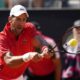 Serbia's Novak Djokovic returns the ball to Chile's Alejandro Tabilo at the Italian Open tennis tournament in Rome, Sunday, May 12, 2024. (AP Photo/Alessandra Tarantino)