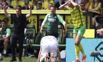 Norwich City's Sydney van Hooijdonk, right, reacts to a decision, during the English Football League Championship playoff, semi-final, first leg soccer match between Norwich and Leeds United, at Carrow Road, Norwich, England, Sunday May 12, 2024. In the race to secure the last promotion spot for the Premier League, Norwich and Leeds drew 0-0 in the first-leg of their Championship play-off semifinal on Sunday. (Steven Paston/PA via AP)