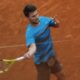 Serbia's Miomir Kecmanovic plays a shot against Russia's Daniil Medvedev during their second round match of the French Open tennis tournament at the Roland Garros stadium in Paris, Thursday, May 30, 2024. (AP Photo/Aurelien Morissard)