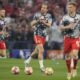 Bayern's Harry Kane, center, applauds fans as he warms up prior to the Champions League semifinal first leg soccer match between Bayern Munich and Real Madrid at the Allianz Arena in Munich, Germany, Tuesday, April 30, 2024. (AP Photo/Matthias Schrader)