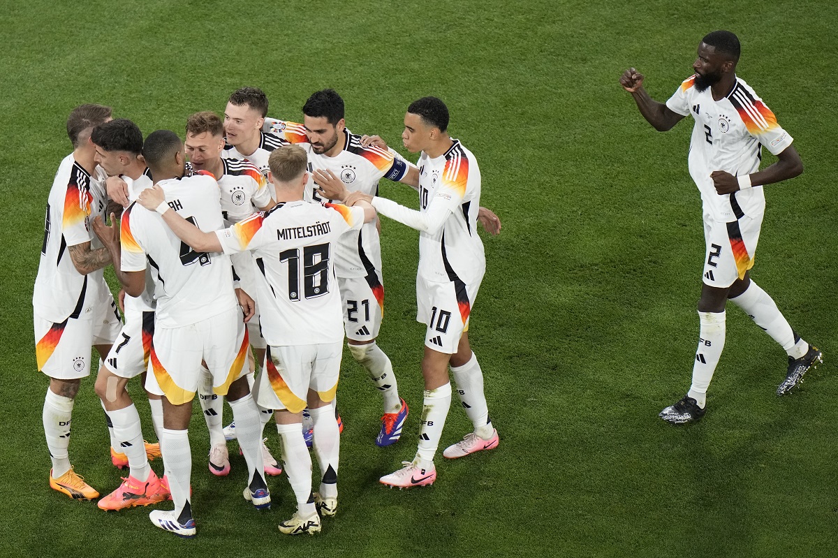 Germany players celebrate their side's third goal during of the Group A match between Germany and Scotland at the Euro 2024 soccer tournament in Munich, Germany, Friday, June 14, 2024. (AP Photo/Sergei Grits)