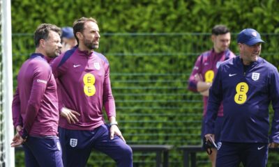 England coach Chris Jones, manager Gareth Southgate, center, and assistant manager Steve Holland during a training session during a training session at the Tottenham Hotspur Training Session, London, Thursday June 6, 2024. (Zac Goodwin/PA via AP)
