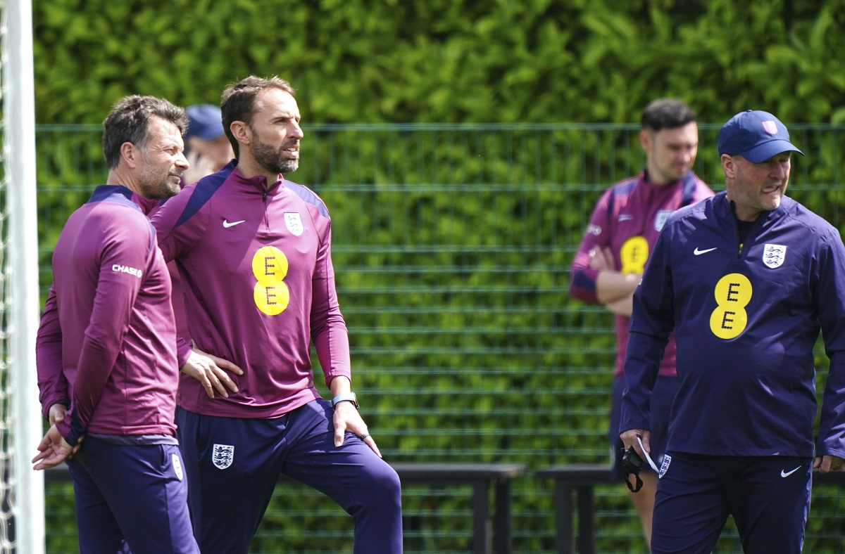 England coach Chris Jones, manager Gareth Southgate, center, and assistant manager Steve Holland during a training session during a training session at the Tottenham Hotspur Training Session, London, Thursday June 6, 2024. (Zac Goodwin/PA via AP)