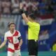 Referee Danny Makkelie, right, talks with Croatia's Luka Modric during a Group B match between Croatia and Italy at the Euro 2024 soccer tournament in Leipzig, Germany, Monday, June 24, 2024. (AP Photo/Ebrahim Noroozi)