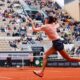 Serbia's Olga Danilovic plays a shot against Marketa Vondrousova of the Czech Republic during their fourth round match of the French Open tennis tournament at the Roland Garros stadium in Paris, Sunday, June 2, 2024. (AP Photo/Jean-Francois Badias)