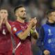 Serbia's Dusan Tadic applauds supporters at the end of a Group C match between Serbia and England at the Euro 2024 soccer tournament in Gelsenkirchen, Germany, Sunday, June 16, 2024. (AP Photo/Andreea Alexandru)