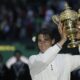 FILE - Spain's Rafael Nadal holds his trophy as he celebrates his defeat of Switzerland's Roger Federer in the men's singles final at Wimbledon, Sunday, July 6, 2008. Nadal is going to skip Wimbledon, as expected, and instead prepare for the Paris Olympics by entering a clay-court tournament in Bastad, Sweden. The 22-time Grand Slam champion said Thursday, June 13, 2024, he wants to just remain on clay, rather than switching over to grass for the All England Club and then needing to go back to clay.(AP Photo/Anja Niedringhaus, File)