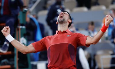 Serbia's Novak Djokovic celebrates winning his third round match of the French Open tennis tournament against Italy's Lorenzo Musetti at the Roland Garros stadium in Paris, Sunday, June 2, 2024. (AP Photo/Jean-Francois Badias)