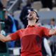 Serbia's Novak Djokovic celebrates winning his third round match of the French Open tennis tournament against Italy's Lorenzo Musetti at the Roland Garros stadium in Paris, Sunday, June 2, 2024. (AP Photo/Jean-Francois Badias)