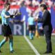 Croatia's head coach Zlatko Dalic, right, talks to French referee Francois Letexier during a Group B match between Croatia and Albania at the Euro 2024 soccer tournament in Hamburg, Germany, Wednesday, June 19, 2024. The match ended in a 2-2 draw. (AP Photo/Ebrahim Noroozi)