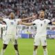 England's Jude Bellingham, left, celebrates his goal with Harry Kane during a round of sixteen match between England and Slovakia at the Euro 2024 soccer tournament in Gelsenkirchen, Germany, Sunday, June 30, 2024. (AP Photo/Matthias Schrader)
