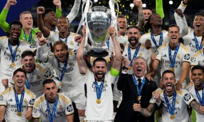 Real Madrid's team captain Nacho lifts the trophy after winning the Champions League final soccer match between Borussia Dortmund and Real Madrid at Wembley stadium in London, Sunday, June 2, 2024. Real Madrid won 2-0. (AP Photo/Frank Augstein)