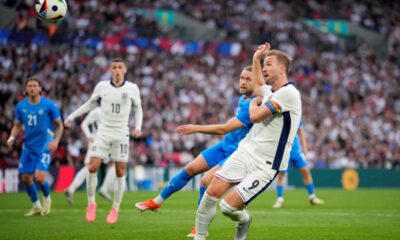 England's Harry Kane shoots on goal during the International friendly soccer match between England and Iceland at Wembley stadium in London, Friday, June 7, 2024.(AP Photo/Kin Cheung)