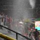 Heavy rain falls as fans await the start of a Group F match between Turkey and Georgia at the Euro 2024 soccer tournament in Dortmund, Germany, Tuesday, June 18, 2024. (AP Photo/Martin Meissner)