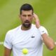 Novak Djokovic of Serbia reacts during a training session on Court 2 at the All England Lawn Tennis and Croquet Club in Wimbledon, London, Friday, June 28, 2024. The Wimbledon Championships begin on July 1. (AP Photo/Kirsty Wigglesworth)