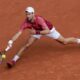 Serbia's Novak Djokovic plays a shot against Argentina's Francisco Cerundolo during their fourth round match of the French Open tennis tournament at the Roland Garros stadium in Paris, Monday, June 3, 2024. (AP Photo/Thibault Camus)