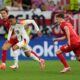 Germany's Jamal Musiala, center, Denmark's Joachim Andersen, back, and Andreas Skov Olsen fight for the ball during a round of sixteen match at the Euro 2024 soccer tournament in Dortmund, Germany, Saturday, June 29, 2024. (AP Photo/Darko Vojinovic)
