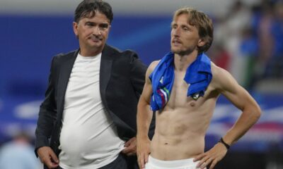 Croatia's head coach Zlatko Dalic, left, looks at Croatia's Luka Modric at the end of Group B match between Croatia and Italy at the Euro 2024 soccer tournament in Leipzig, Germany, Monday, June 24, 2024. (AP Photo/Sunday Alamba)