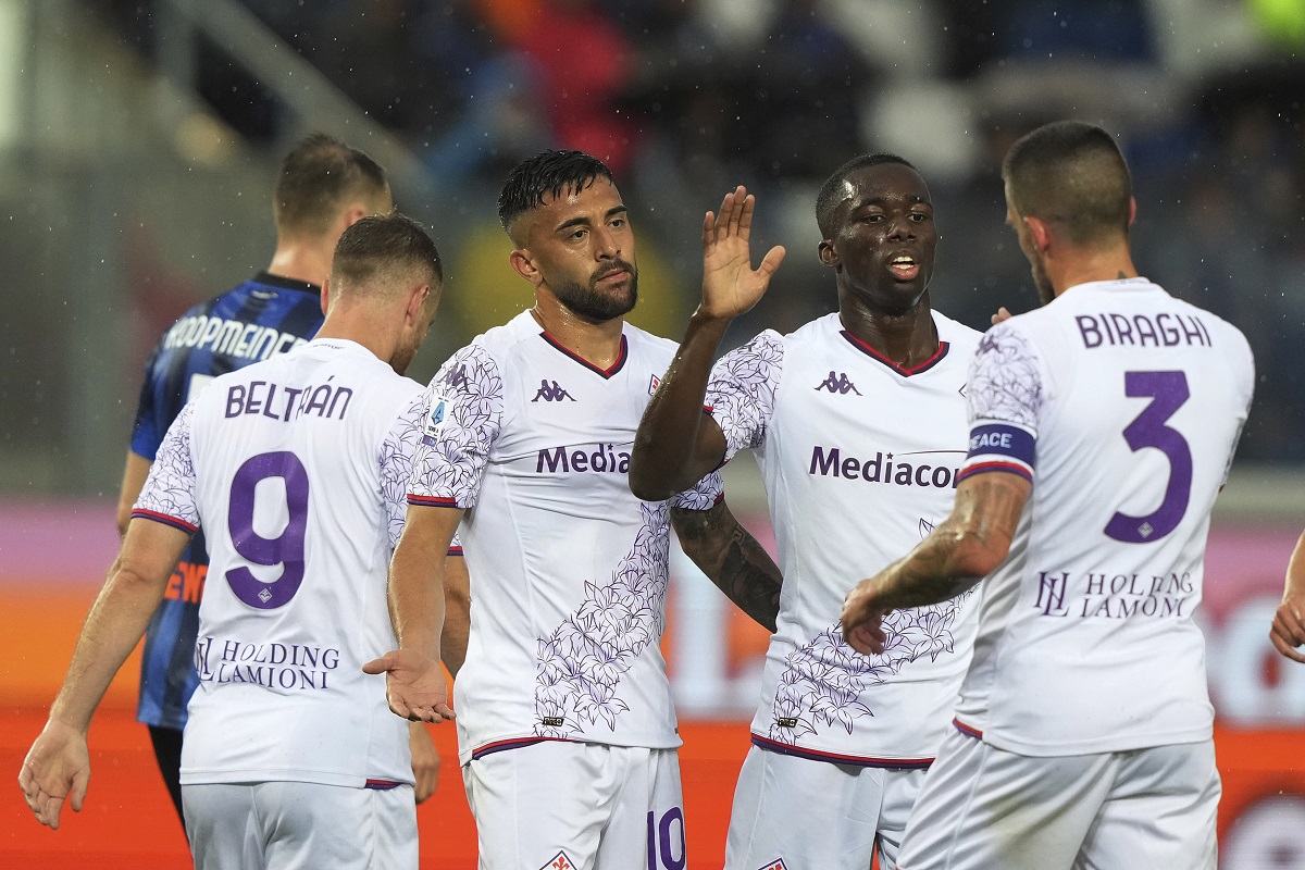 Fiorentina's Nico Gonzales, third right, celebrates with teammates scoring their side's second goal of the game during the Italian Serie A soccer match between Atalanta and Fiorentina at the Gewiss Stadium, in Bergamo, Italy, Sunday June 2, 2024. (Spada/LaPresse via AP)