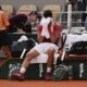 Serbia's Novak Djokovic dries his face during a changeover in his fourth round match of the French Open tennis tournament at the Roland Garros stadium in Paris, Monday, June 3, 2024. (AP Photo/Thibault Camus)