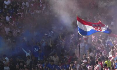 Croatia fans cheer during a Group B match between Croatia and Albania at the Euro 2024 soccer tournament in Hamburg, Germany, Wednesday, June 19, 2024. (AP Photo/Sunday Alamba)