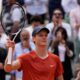 Italy's Jannik Sinner celebrates as he won the quarterfinal match of the French Open tennis tournament against Bulgaria's Grigor Dimitrov at the Roland Garros stadium in Paris, Tuesday, June 4, 2024. (AP Photo/Thibault Camus)