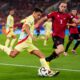 Spain's Jesus Navas, left, shoots the ball next to Albania's Mario Mitaj during a Group B match between Albania and Spain at the Euro 2024 soccer tournament in Dusseldorf, Germany, Monday, June 24, 2024. (AP Photo/Manu Fernandez)