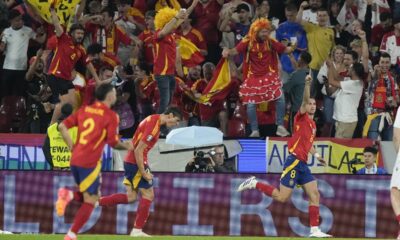 Spain's Fabian Ruiz, right, celebrates after scoring during a round of sixteen match between Spain and Georgia at the Euro 2024 soccer tournament in Cologne, Germany, Sunday, June 30, 2024. (AP Photo/Martin Meissner)