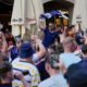 Scotland's soccer team fans cheer in 'Marienplatz' square next to the town hall in downtown Munich, Germany, Thursday, June 13, 2024. The Euro 2024 soccer tournament takes place in Germany from June 14 until July 14. (AP Photo/Ariel Schalit)