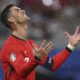 APTOPIX Portugal's Cristiano Ronaldo gestures during a Group F match between Portugal and Czech Republic at the Euro 2024 soccer tournament in Leipzig, Germany, Tuesday, June 18, 2024. (Robert Michael/dpa via AP)